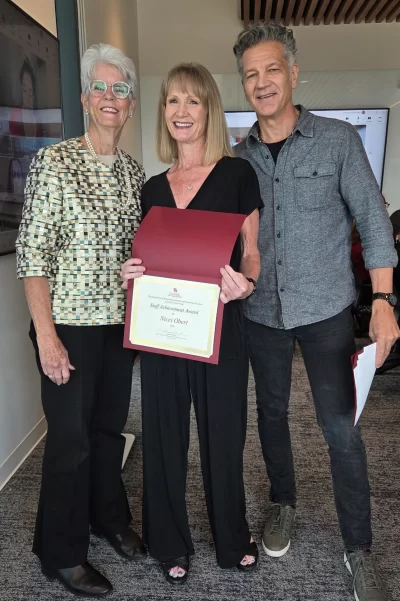 nicci obert receiving staff achievement award